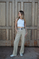 High-waisted women’s golf trousers with tailored straight-leg fit and 4-way stretch, chic golf outfit designed for on and off the course. Crossover Golf apparel 