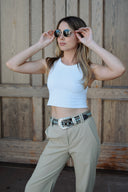 High-waisted women’s golf trousers with tailored straight-leg fit and 4-way stretch, chic golf outfit designed for on and off the course. Crossover Golf apparel 