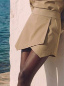 Crossover Golf Par Skort, tailored women’s golf skort with structured fit and refined silhouette, styled as a chic golf outfit for modern country club style on and off the course. Chic golf skort. Chic yacht skirt