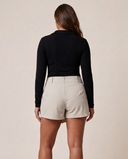 Crossover Golf Ace Asymmetric Skort, tailored women’s golf skort with asymmetric front and sculpting fit, made from Japanese Paper Nylon performance fabric, styled as a chic golf outfit for modern country club style on and off the course