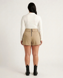 Crossover Golf Par Skort, tailored women’s golf skort with structured fit and refined silhouette, styled as a chic golf outfit for modern country club style on and off the course. Chic golf skort. Chic yacht skirt. Long sleeve polo. Chic women golf polo. Cool womens golf polo. 