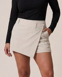 Crossover Golf Ace Asymmetric Skort, tailored women’s golf skort with asymmetric front and sculpting fit, made from Japanese Paper Nylon performance fabric, styled as a chic golf outfit for modern country club style on and off the course