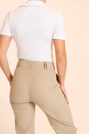 High-waisted women’s golf trousers with tailored straight-leg fit and 4-way stretch, chic golf outfit designed for on and off the course. Crossover Golf apparel 