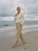 High-waisted women’s golf trousers with tailored straight-leg fit and 4-way stretch, chic golf outfit designed for on and off the course. Crossover Golf apparel 