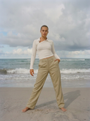 High-waisted women’s golf trousers with tailored straight-leg fit and 4-way stretch, chic golf outfit designed for on and off the course. Crossover Golf apparel 