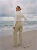 High-waisted women’s golf trousers with tailored straight-leg fit and 4-way stretch, chic golf outfit designed for on and off the course. Crossover Golf apparel 