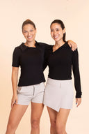 Crossover Golf New Classic Polo, tailored women’s golf polo with asymmetric placket and ultra-soft micromodal fabric, styled as a chic golf outfit for modern country club style on and off the course