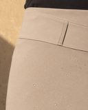 Crossover Golf Ace Asymmetric Skort, tailored women’s golf skort with asymmetric front and sculpting fit, made from Japanese Paper Nylon performance fabric, styled as a chic golf outfit for modern country club style on and off the course. Water resistant skort. Water repellant skort.