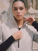 Crossover Golf Condor Cropped Windbreaker, tailored women’s golf jacket with cropped silhouette and Japanese Paper Nylon performance fabric, styled as a chic golf outfit for modern country club style on and off the course. Legion Of Honor San Francisco