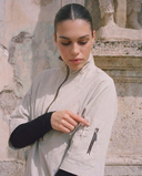 Crossover Golf Condor Cropped Windbreaker, tailored women’s golf jacket with cropped silhouette and Japanese Paper Nylon performance fabric, styled as a chic golf outfit for modern country club style on and off the course. Legion Of Honor San Francisco