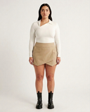 Crossover Golf Par Skort, tailored women’s golf skort with structured fit and refined silhouette, styled as a chic golf outfit for modern country club style on and off the course. Chic golf skort. Chic yacht skirt. Long sleeve polo. Chic women golf polo. Cool womens golf polo. 