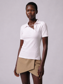 Crossover Golf New Classic Polo, tailored women’s golf polo with asymmetric placket and ultra-soft micromodal fabric, styled as a chic golf outfit for modern country club style on and off the course. luxury womens golf clothes. womens golfwear. mother of pearl shell button. 