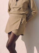 Crossover Golf Par Skort, tailored women’s golf skort with structured fit and refined silhouette, styled as a chic golf outfit for modern country club style on and off the course. Chic golf skort. Chic yacht skirt. Long sleeve polo. Chic women golf polo. Cool womens golf polo. country club style. country club womens style