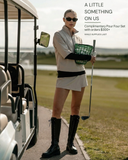 Crossover Golf A Little Something on Us campaign featuring the Condor Cropped Windbreaker and Ace Asymmetric Skort