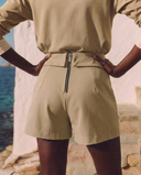Crossover Golf Par Skort, tailored women’s golf skort with structured fit and refined silhouette, styled as a chic golf outfit for modern country club style on and off the course. Chic golf skort. Chic yacht skirt. Long sleeve polo. Chic women golf polo. Cool womens golf polo. country club style. country club womens style