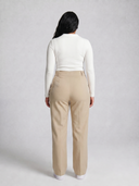 High-waisted women’s golf trousers with tailored straight-leg fit and 4-way stretch, chic golf outfit designed for on and off the course.Water repellant women's golf pant. Machine washable women's golf pant. Flattering womens golf pant. Cool women's golf pant. Crossover Golf by Melanie Friedman. Golf fashion house. golf high fashion. golf chic clothes for women. womens golf plus size. plus size womens trouser. 