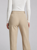 High-waisted women’s golf trousers with tailored straight-leg fit and 4-way stretch, chic golf outfit designed for on and off the course.Water repellant women's golf pant. Machine washable women's golf pant. Flattering womens golf pant. Cool women's golf pant. Crossover Golf by Melanie Friedman. Golf fashion house. golf high fashion. golf chic clothes for women