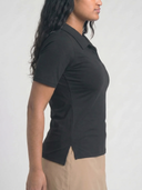 Crossover Golf New Classic Polo, tailored women’s golf polo with asymmetric placket and ultra-soft micromodal fabric, styled as a chic golf outfit for modern country club style on and off the course. luxury womens golf clothes. womens golfwear. mother of pearl shell button. Plus size womens golf