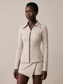 Crossover Golf Fairway Fit Zip Top, sculpted women’s golf zip top with tailored fit, princess seams, and Japanese Paper Nylon performance fabric, styled as a chic golf outfit for modern country club style on and off the course. Chic women's golf long sleeve zipper top. Chic women's golf apparel. 