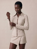 Crossover Golf Fairway Fit Zip Top, sculpted women’s golf zip top with tailored fit, princess seams, and Japanese Paper Nylon performance fabric, styled as a chic golf outfit for modern country club style on and off the course. Chic women's golf long sleeve zipper top. Chic women's golf apparel. 