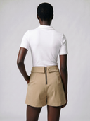 Crossover Golf Par Skort, tailored women’s golf skort with structured fit and refined silhouette, styled as a chic golf outfit for modern country club style on and off the course. Chic golf skort. Chic yacht skirt. Long sleeve polo. Chic women golf polo. Cool womens golf polo. country club style. country club womens style